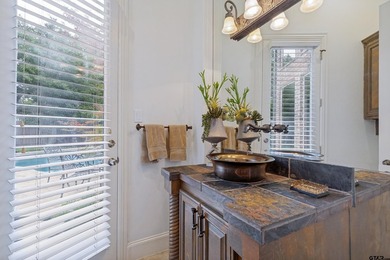 Situated in the prestigious gated community of The Lakes on - photo 17