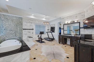 Situated in the prestigious gated community of The Lakes on - photo 23