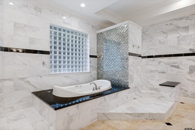 Situated in the prestigious gated community of The Lakes on - photo 24