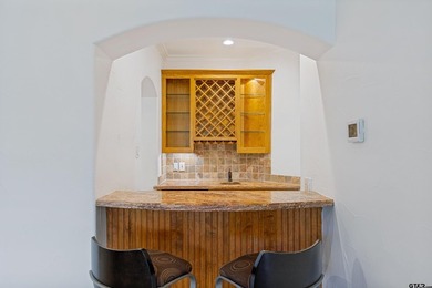 Situated in the prestigious gated community of The Lakes on - photo 32
