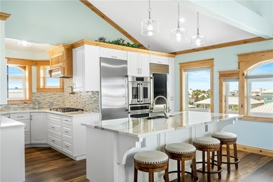 Experience the pinnacle of coastal luxury in this meticulously &