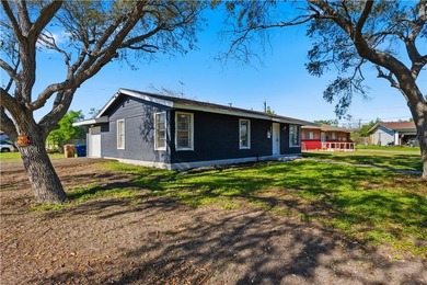 This inviting three-bedroom, one-bath home sits on a desirable - photo 4