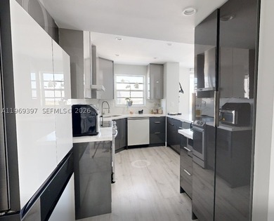 Experience the best of waterfront living in this fully renovated - photo 6