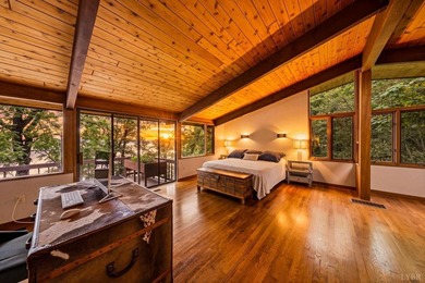 Nestled at the end of a private drive, this lakeside sanctuary - photo 11