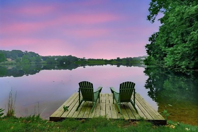 Nestled at the end of a private drive, this lakeside sanctuary - photo 13