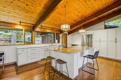 Nestled at the end of a private drive, this lakeside sanctuary - photo 22