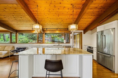 Nestled at the end of a private drive, this lakeside sanctuary - photo 24