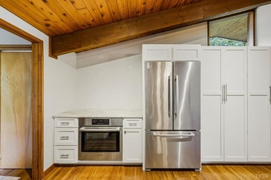 Nestled at the end of a private drive, this lakeside sanctuary - photo 26