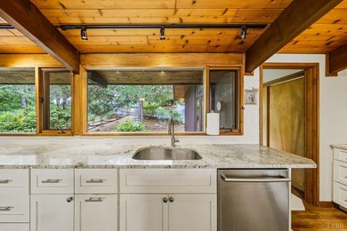 Nestled at the end of a private drive, this lakeside sanctuary - photo 27