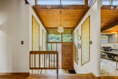 Nestled at the end of a private drive, this lakeside sanctuary - photo 34