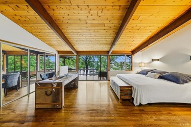 Nestled at the end of a private drive, this lakeside sanctuary - photo 36