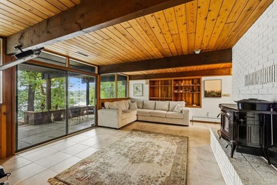 Nestled at the end of a private drive, this lakeside sanctuary - photo 47