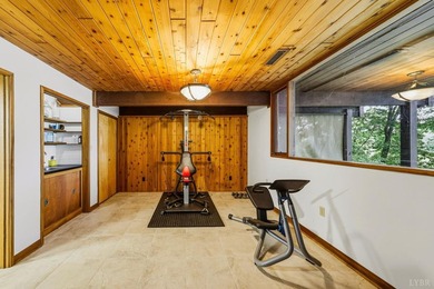 Nestled at the end of a private drive, this lakeside sanctuary - photo 48