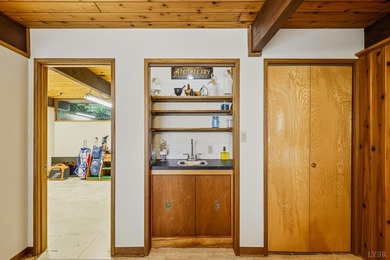 Nestled at the end of a private drive, this lakeside sanctuary - photo 49