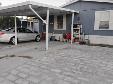 Spacious Double-Wide Mobile Home with Modern Updates! This - photo 1