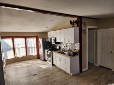 Spacious Double-Wide Mobile Home with Modern Updates! This - photo 4