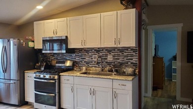 Spacious Double-Wide Mobile Home with Modern Updates! This - photo 5