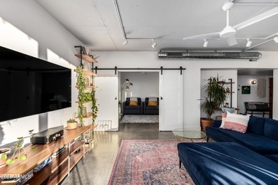 This stunning corner-unit apartment offers high-rise living with