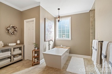Beautiful brick home featuring an open floor plan and a spacious - photo 10