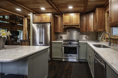 This magnificent year-round log home on First Lake offers 200 - photo 12