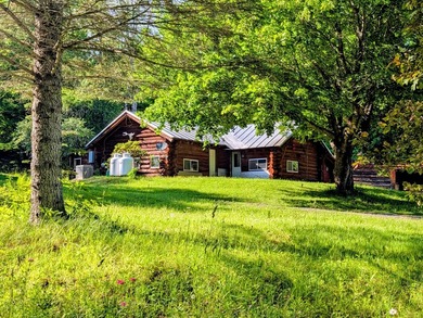 Welcome to this unique four-season cabin, rich in history - photo 3