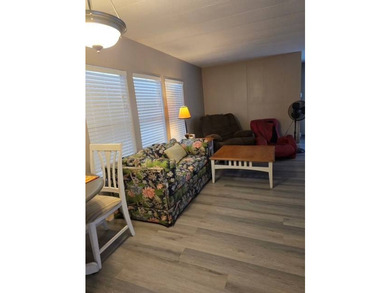 Live on the water ! Lovely screened in porch all year views of - photo 8
