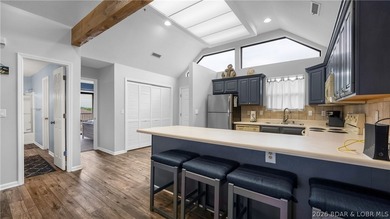 This top-floor 2BR/2BA unit offers privacy, thoughtful upgrades - photo 11