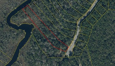 Build your dream home on this 1.5 acre waterfront lot in the - photo 2