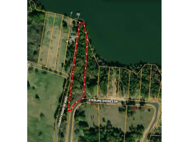 Wonderful 2.5 acre lakefront lot, with 161 ft of shoreline. The - photo 7