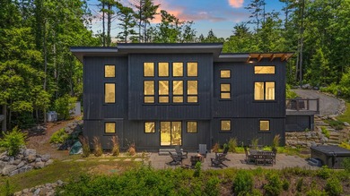 Discover a rare 10+ acre waterfront property encompassing two - photo 2