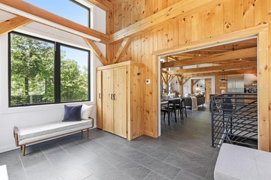 Discover a rare 10+ acre waterfront property encompassing two - photo 10