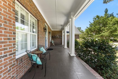 Positioned along the 5th hole in Porters Neck Country Club, this - photo 8