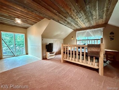 Discover the charm of lakeside living in this custom-built 2 - photo 11
