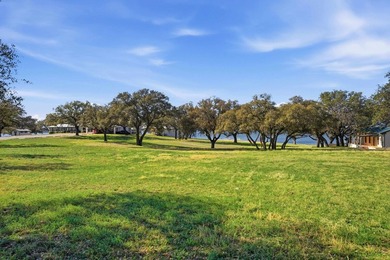564' of Lake Buchanan shoreline. 6.3 acres. Eleven cabins. This - photo 12