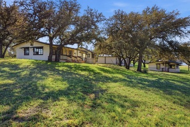 564' of Lake Buchanan shoreline. 6.3 acres. Eleven cabins. This - photo 18