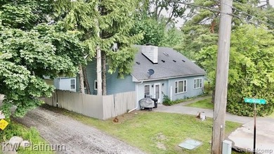 Discover the charm of lakeside living in this custom-built 2 - photo 18