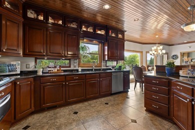 Experience exceptional waterfront living in this custom luxury - photo 49