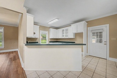 GOLF COURSE LIVING IN RIVER POINTE! Nestled on a quiet - photo 9