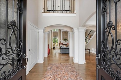 Elegant four-sided brick home with a luxurious primary suite on - photo 3