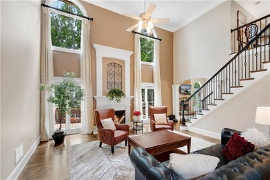 Elegant four-sided brick home with a luxurious primary suite on - photo 8