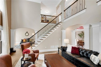 Elegant four-sided brick home with a luxurious primary suite on - photo 9