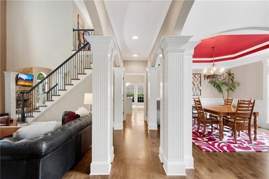 Elegant four-sided brick home with a luxurious primary suite on - photo 10