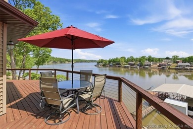 Vaulted ceilings, walls of windows, and wood-burning fireplace - photo 15