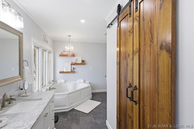 Vaulted ceilings, walls of windows, and wood-burning fireplace - photo 20