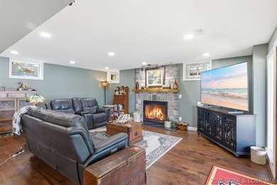 Vaulted ceilings, walls of windows, and wood-burning fireplace - photo 32