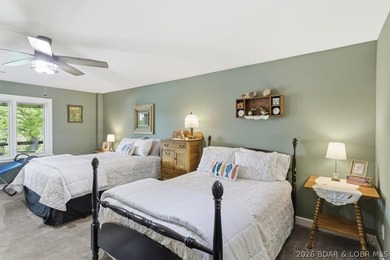 Vaulted ceilings, walls of windows, and wood-burning fireplace - photo 33