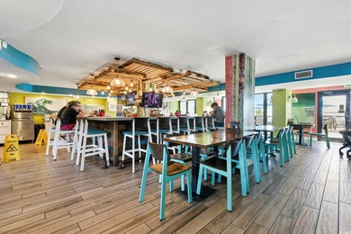 Wake up to the sound of waves and endless ocean views from this