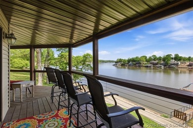 Vaulted ceilings, walls of windows, and wood-burning fireplace - photo 38