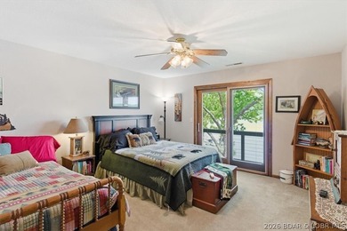 Vaulted ceilings, walls of windows, and wood-burning fireplace - photo 41