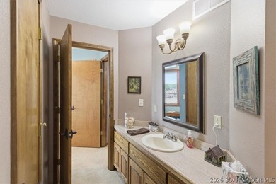 Vaulted ceilings, walls of windows, and wood-burning fireplace - photo 42
